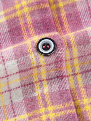 Oversized shacket with pink, yellow, and white plaid pattern and a button detail.