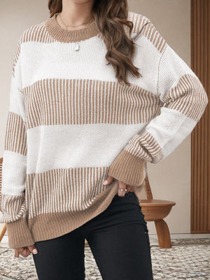 Nautical stripe knit crewneck sweater in tan and white, with ribbed cuffs and hem.