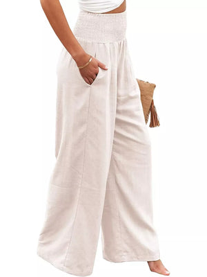 Maternity wide-leg pants in Tan with smocked waist and pockets.