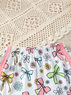 Baby girls' white one-piece with colorful bows and flowers print, pink trim
