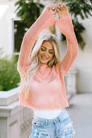 Peach openwork crochet crop sweater with V-stitch detail and scalloped hem.