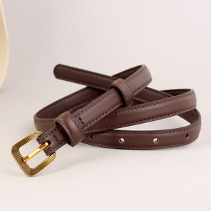 Brown cowhide leather accent belt with antique brass buckle and keeper loop.