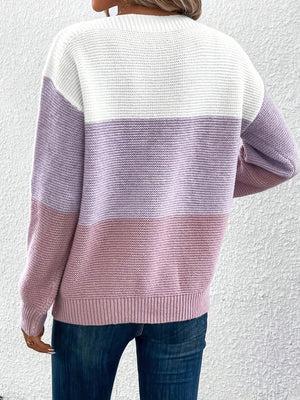 Colorblock ribbed knit sweater in white, lavender, and pink with a boatneck.