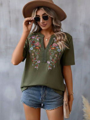 Army green V-neck tee with floral embroidery and crochet trim, short sleeves.