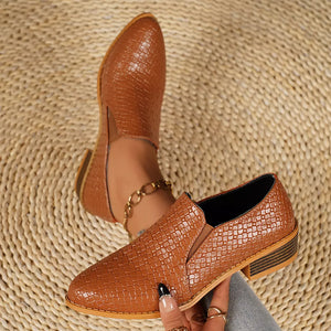 Tan woven texture pointed loafers with block heels and elastic gore.