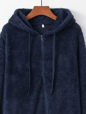 Navy blue fuzzy fleece half-zip hoodie with drawstring and hood.