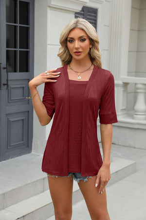 Burgundy textured layered square neckline blouse with short sleeves.