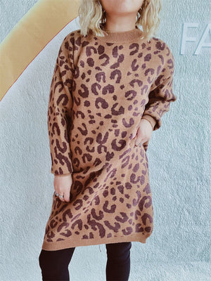 Leopard knit mini dress in caramel with long sleeves and crew neck.