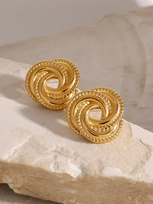 Gold swirl knot stud earrings with textured rope detail, 18K gold-plated.