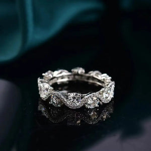 Silver moissanite eternity wave ring with round cut stones