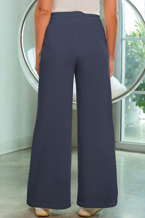 Palazzo joggers in French Blue with elastic waist and center seam detail.