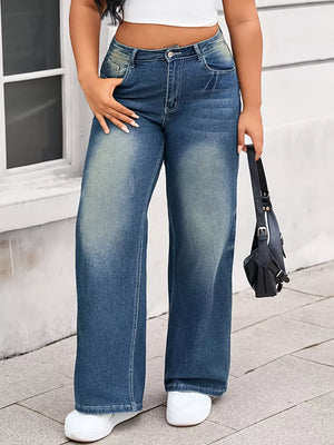 Plus size wide leg jeans in blue denim with vintage wash and relaxed fit.