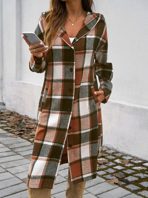 Checked plaid hooded duster coat in brown with button front and pockets.