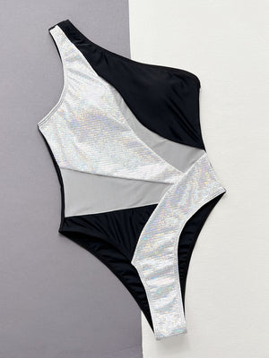 Black one-shoulder swimsuit with sequin panels and mesh cutouts
