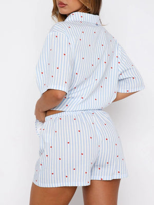 Light Blue striped heart print pajama set with collared buttoned top and shorts.