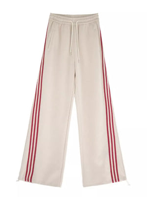 Apricot maternity joggers with side stripes and drawstring waist