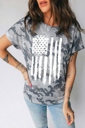 Grey camouflage crew neck t-shirt with distressed white American flag graphic.