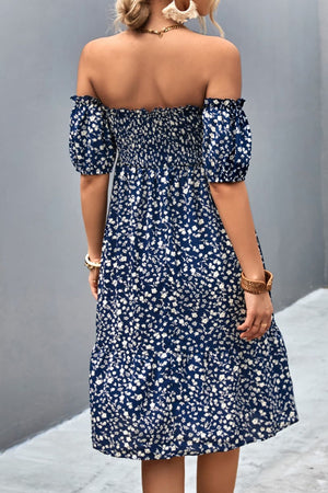 Dark blue floral midi dress with smocked bodice and off-the-shoulder bubble sleeves