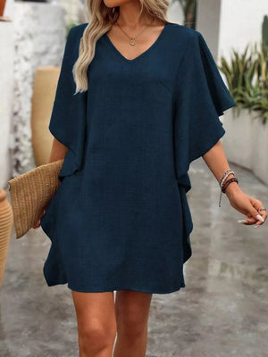 Dark navy ruffled sleeve V-neck mini dress with a textured fabric.