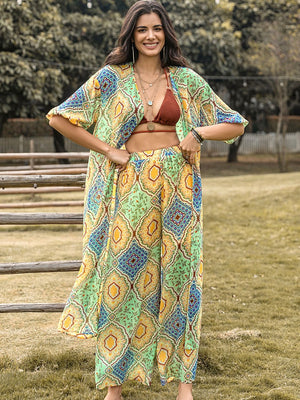 Bohemian print duster and palazzo set in Gum Leaf with a geometric pattern, featuring a flowing duster and wide-leg pants.