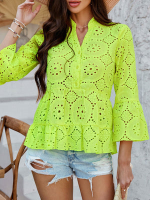 Neon yellow eyelet embroidered peplum blouse with ruffles and bell sleeves.