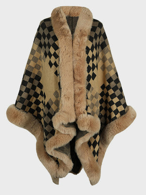 Beige checkered acrylic cape with faux fur trim and pom-poms.