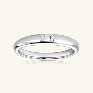 Silver baguette cut moissanite band ring with a single rectangular stone.