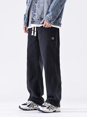 Men's black loose fit drawstring sweatpants with side detail