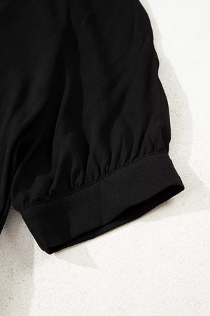 Black maternity maxi dress sleeve detail with gathered fabric and elastic cuff