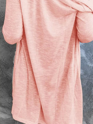 Watermelon pink cotton blend cardigan with long sleeves and pockets.
