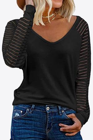 Black V-neck top with sheer striped sleeves