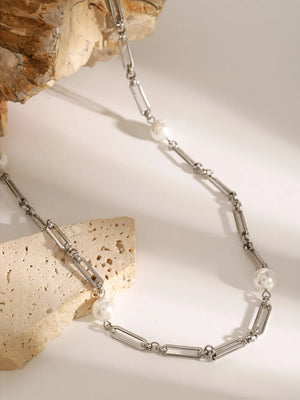 Silver two-tone pearl link necklace with alternating chain and pearl elements.