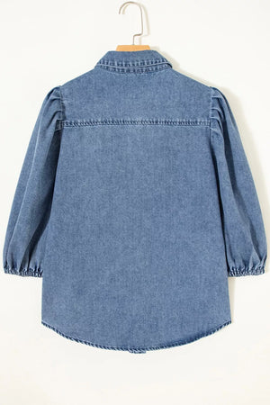 Voluminous puff sleeve denim maternity blouse with collared neckline and button-down front.
