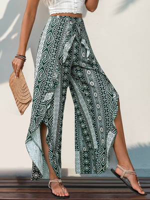 Geometric print palazzo pants in Air Force Blue with ruffle trim and side slits.