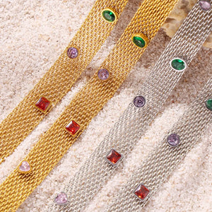 Gold and silver mesh collars with colorful gemstone embellishments