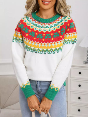 White knit sweater with charming clover and geometric pattern, green cuffs and neckline.