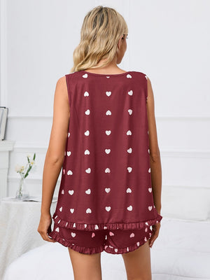 Burgundy heart print loungewear set with ruffle hem shorts and sleeveless top.