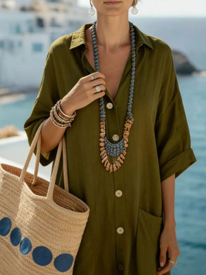 Olive green button-front maxi dress with 3/4 sleeves and pockets.