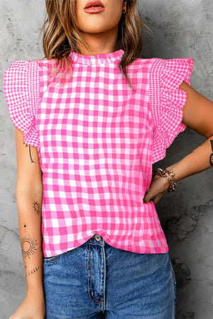 Fuchsia pink gingham ruffle sleeve mock neck blouse with smocked details.