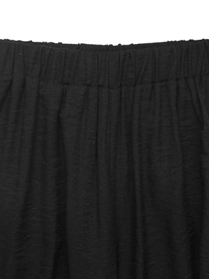 Black wide leg pants with elastic waistband and textured fabric