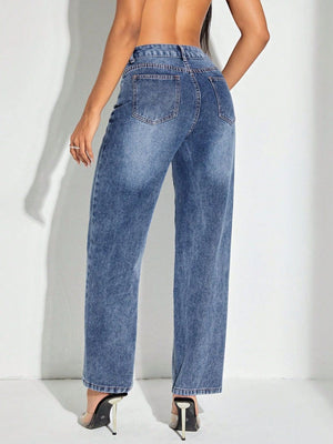 Medium wash cotton denim jeans with a straight leg cut and buttoned closure.