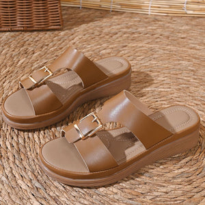 Sophisticated open-toe buckle sandals in khaki with gold buckle detail.