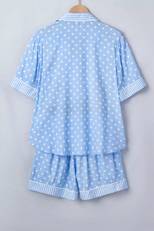 Blue polka dot viscose pajama set with white stripes on collar, cuffs, and hem.
