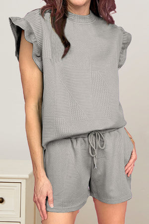 Gray textured lounge set with flutter sleeves and drawstring shorts.