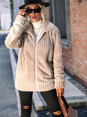 Plush ribbed zip-up jacket in Sand with a collared neckline.