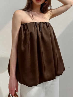 Dark brown strapless bubble hem top with gathered neckline and voluminous silhouette.
