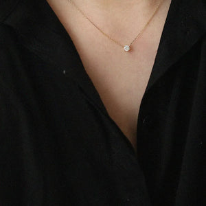 Elegant sterling silver necklace with a clear zircon pendant.