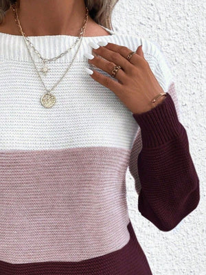Colorblock ribbed knit sweater with boatneck and burgundy sleeves.