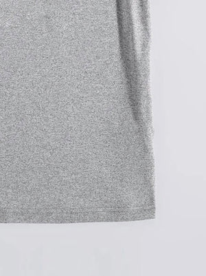 Gray oversized graphic tee with a heathered texture.