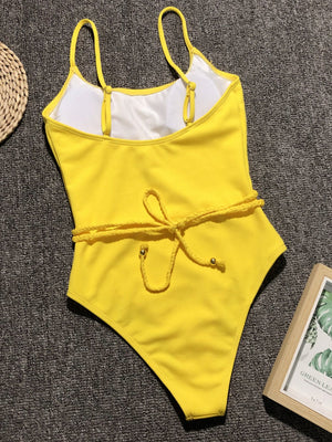 Yellow ribbed one-piece swimsuit with braided waist tie and adjustable straps